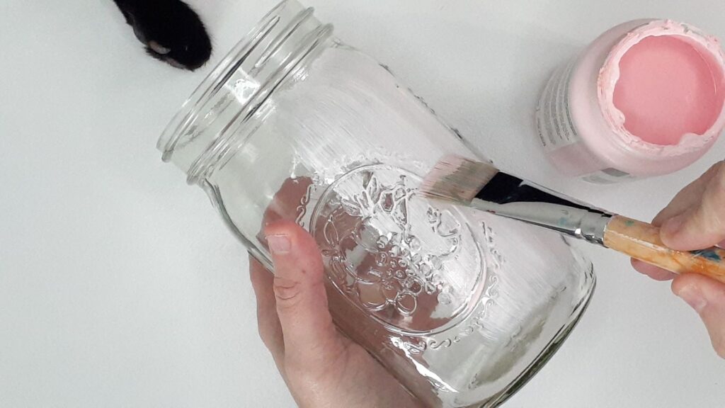 Paint your mason jar. It may take a few coats. 