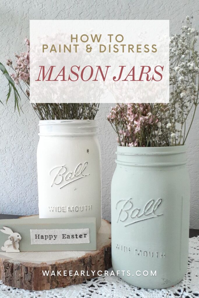 Two mason jars painted with chalk paint. 