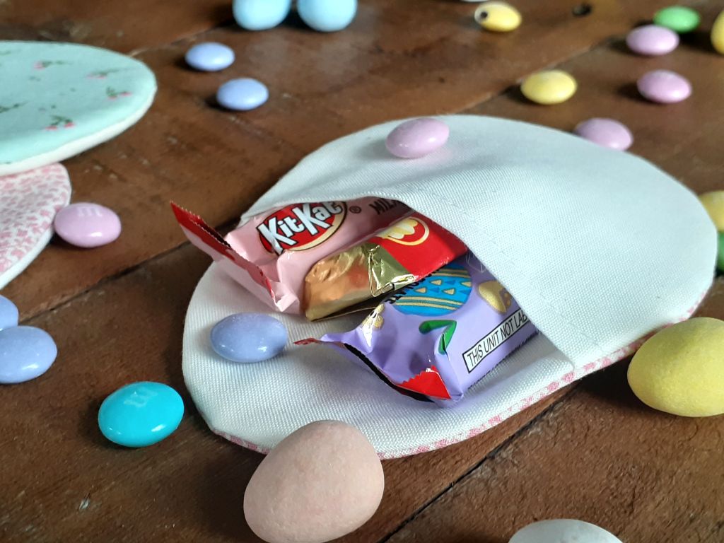 Refillable fabric Easter egg filled with candy.